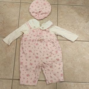 Pink floral corduroy overalls with matching beret.